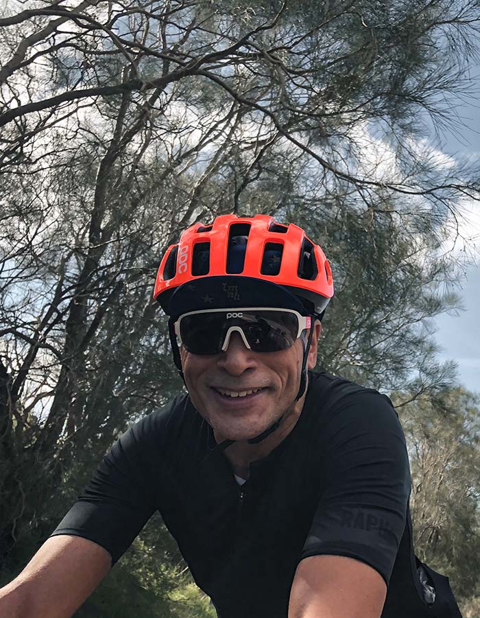 male-cyclist-smiling